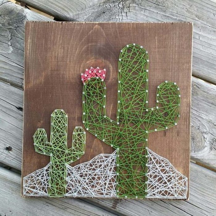 cuadro de cactus hecho con hilos 